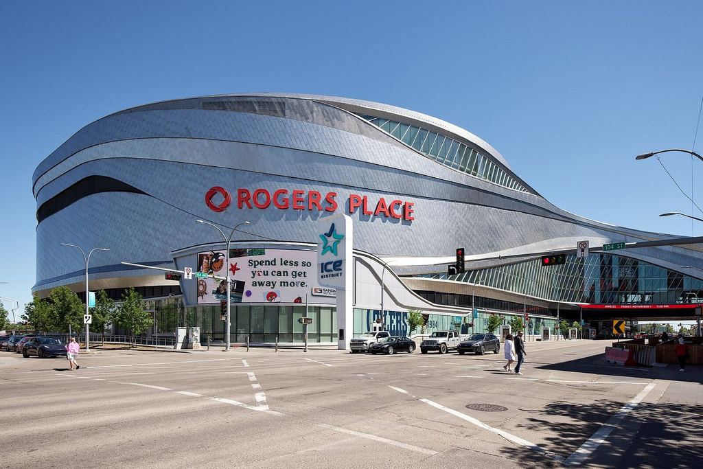 Rogers Place arena in downtown Edmonton seen from the street on a summer day